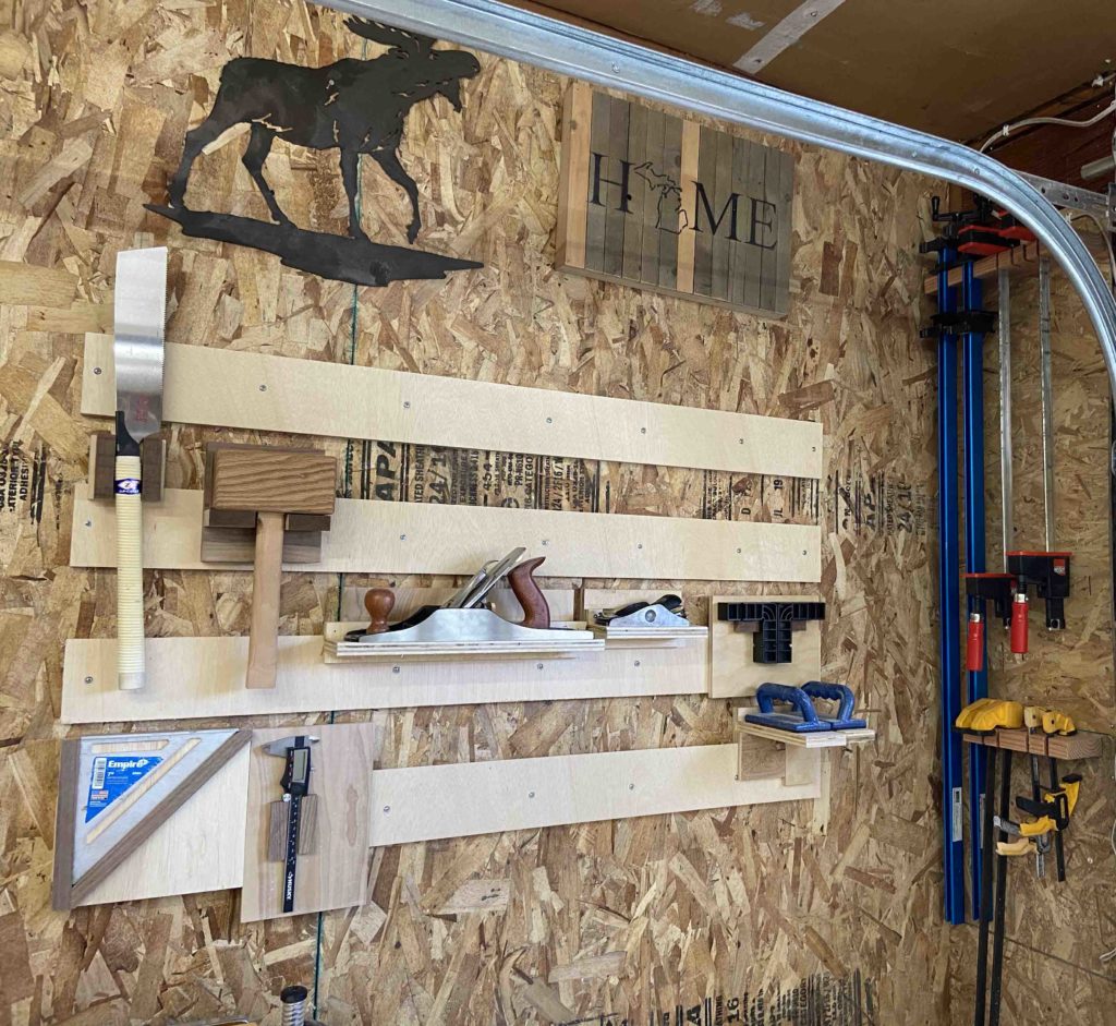French cleat wall helps you organize a small workshop by getting your most used hand tools out of the way, yet still visible.